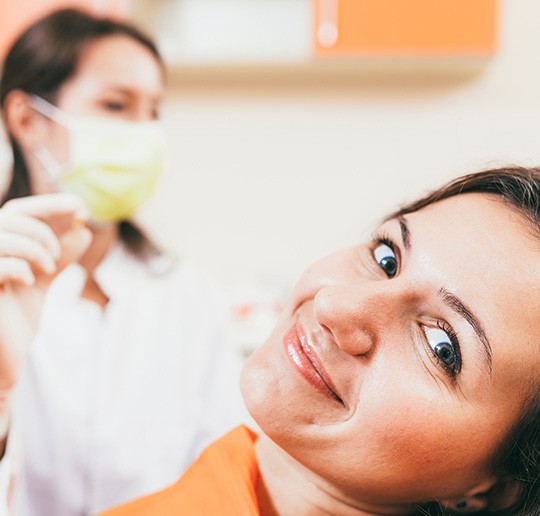 Emergency dentist in Gahanna performing an exam