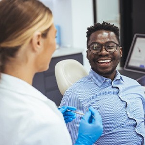 Patient smiling during checkup with Gahanna dentist